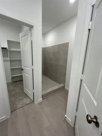 a view of an empty walk in closet