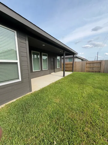 a house view with a garden space