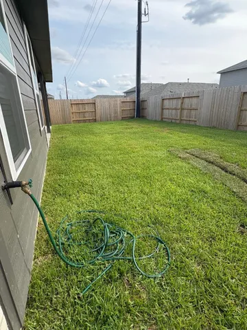 a view of a backyard with garden