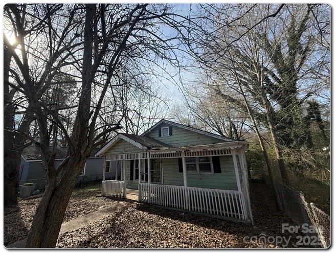 515 South Maple Street Dallas, NC 28034 - Photo 11 of 12 a front view of a house with a yard
