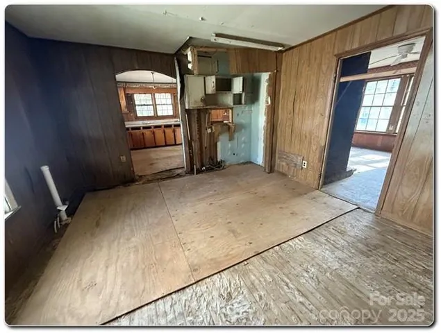 a view of a livingroom with furniture and windows