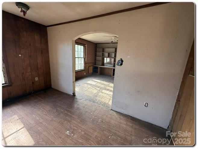 515 South Maple Street Dallas, NC 28034 - Photo 7 of 12 a view of a big room with a furniture and a ceiling fan