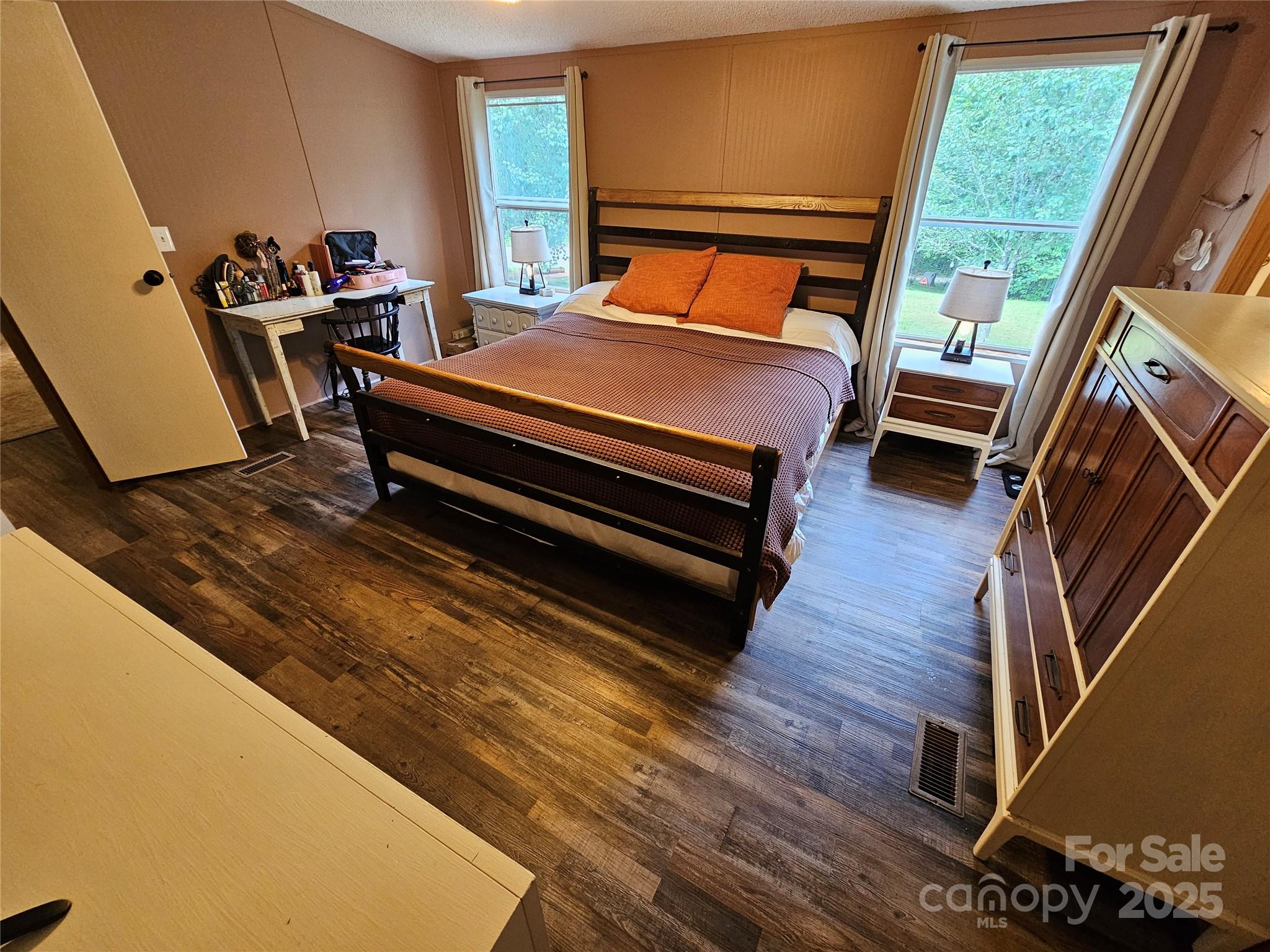 5062 Taylor Farm Road Lenoir, NC 28645 - Photo 17 of 25 a bed room with a bed furniture and a window
