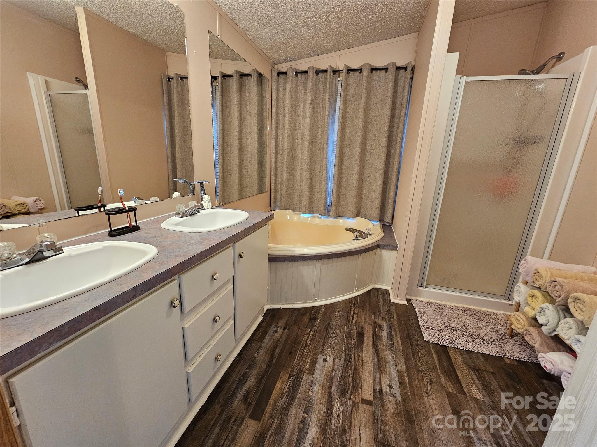 5062 Taylor Farm Road Lenoir, NC 28645 - Photo 20 of 25 a bathroom with a double vanity sink and a mirror