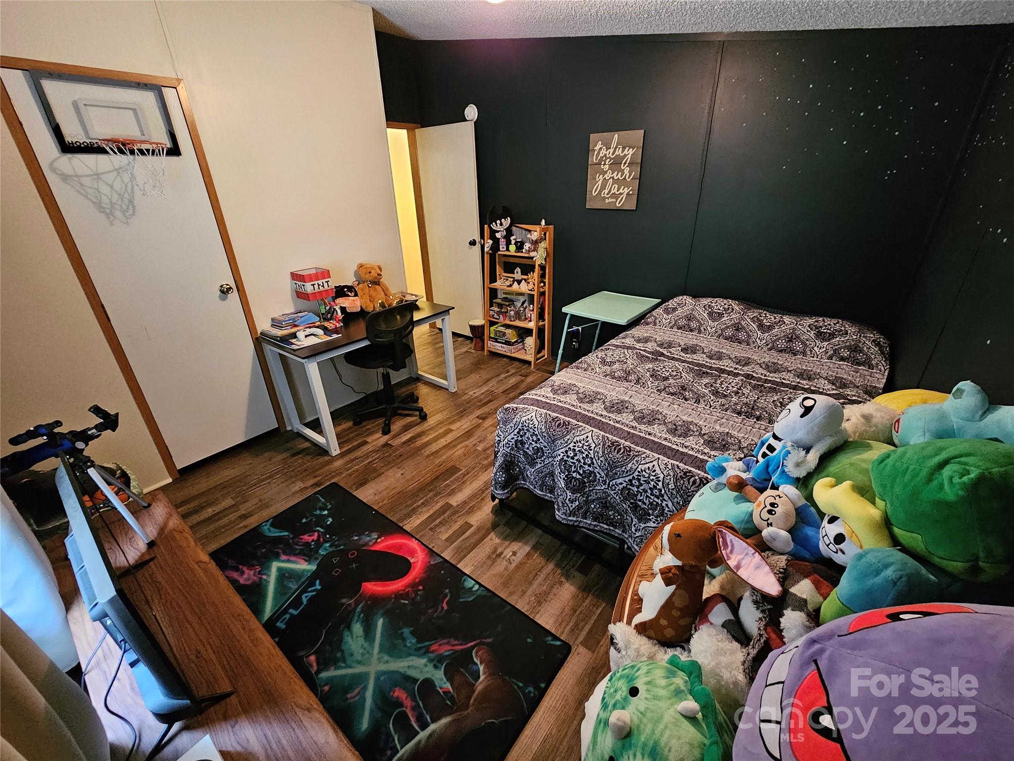 5062 Taylor Farm Road Lenoir, NC 28645 - Photo 21 of 25 a bedroom with bed and a mirror