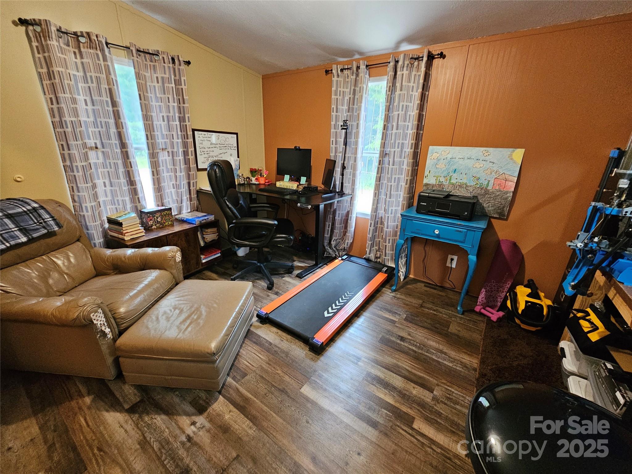 5062 Taylor Farm Road Lenoir, NC 28645 - Photo 23 of 25 a living room with furniture and a fireplace
