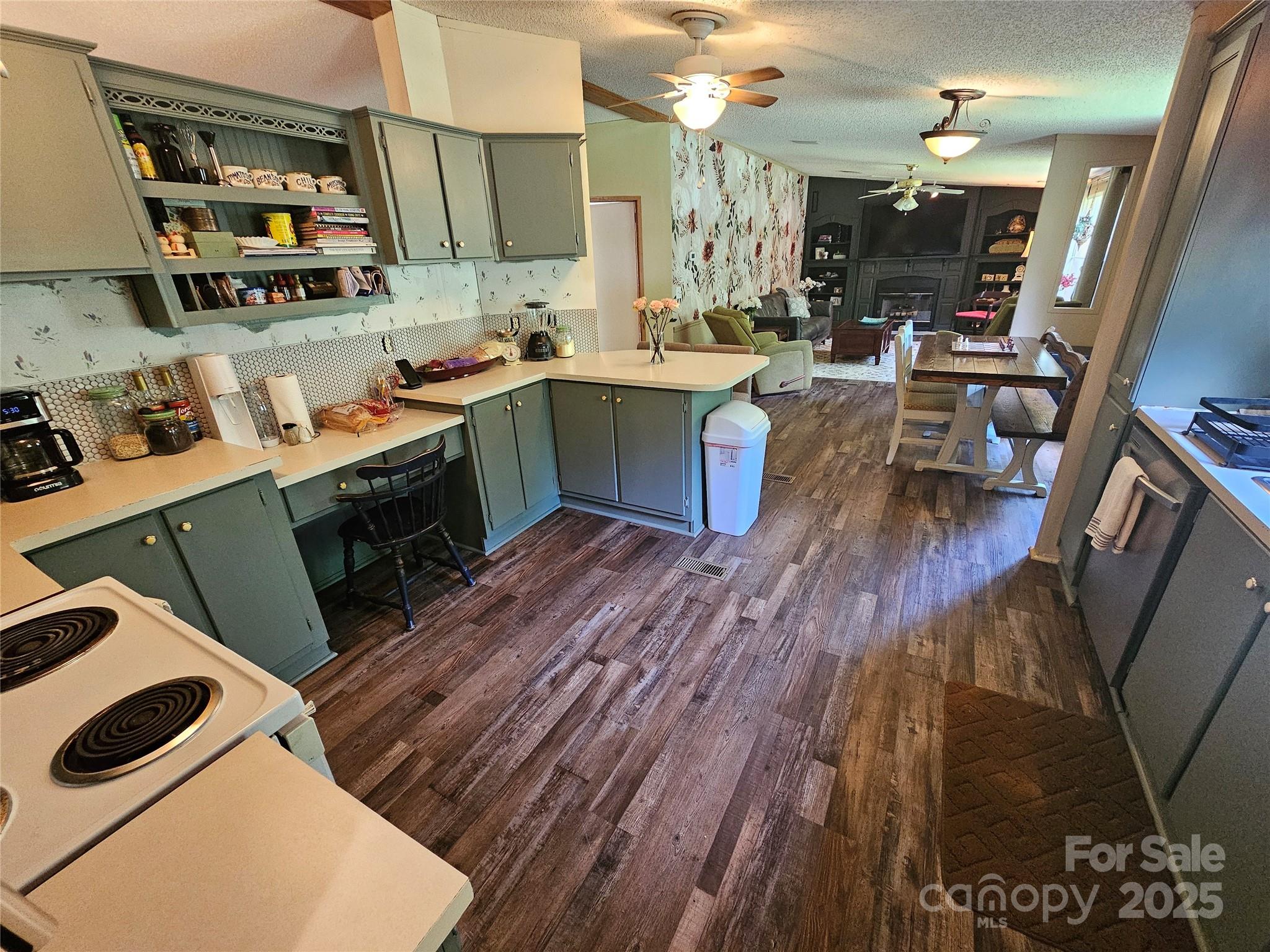 5062 Taylor Farm Road Lenoir, NC 28645 - Photo 9 of 25 a kitchen with a sink and cabinets