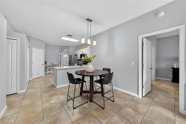 a view of a dining room with furniture