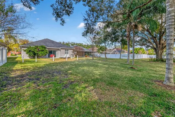 a view of a house with a big yard