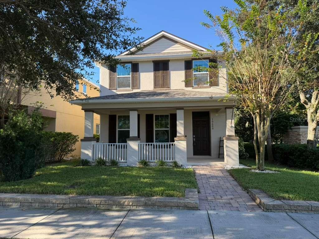 front view of a house with a yard