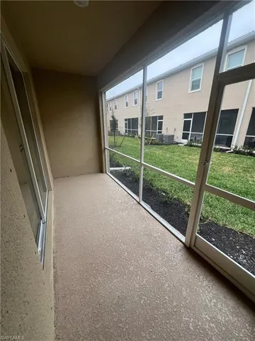 a view of backyard with green space