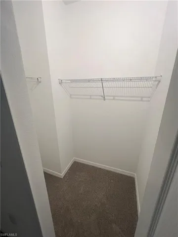 a view of small space with racks on the wall