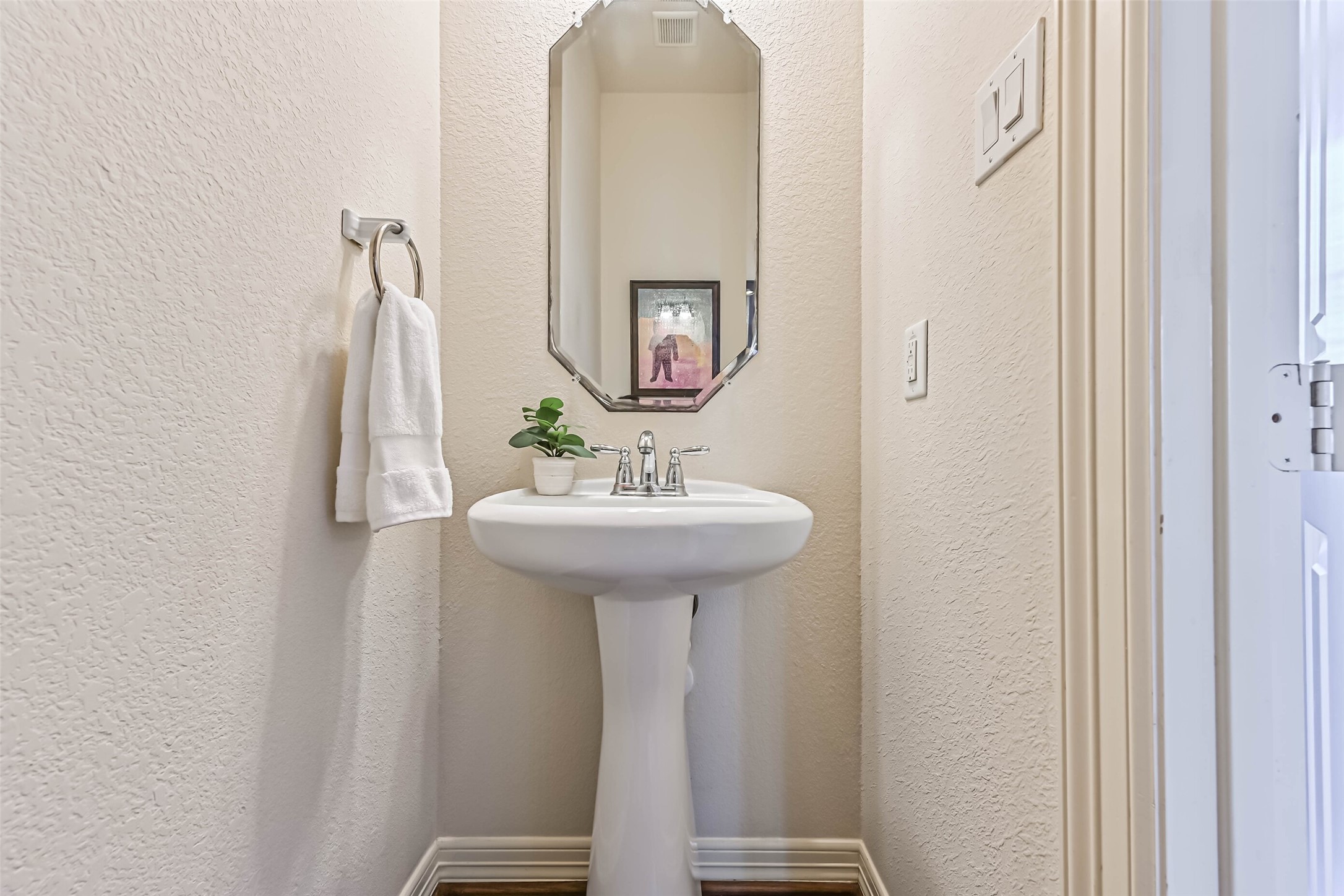 3208 Clearview Circle Houston, TX 77025 - Photo 16 of 30 a bathroom with a sink and mirror