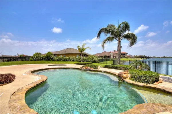 a view of a swimming pool and lake view