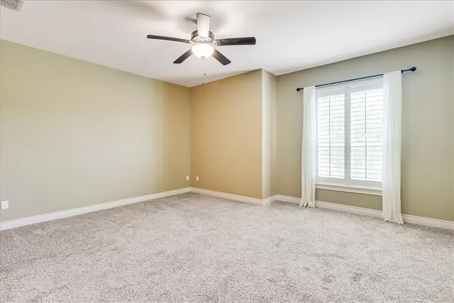 a view of a large body of water with a building in the background