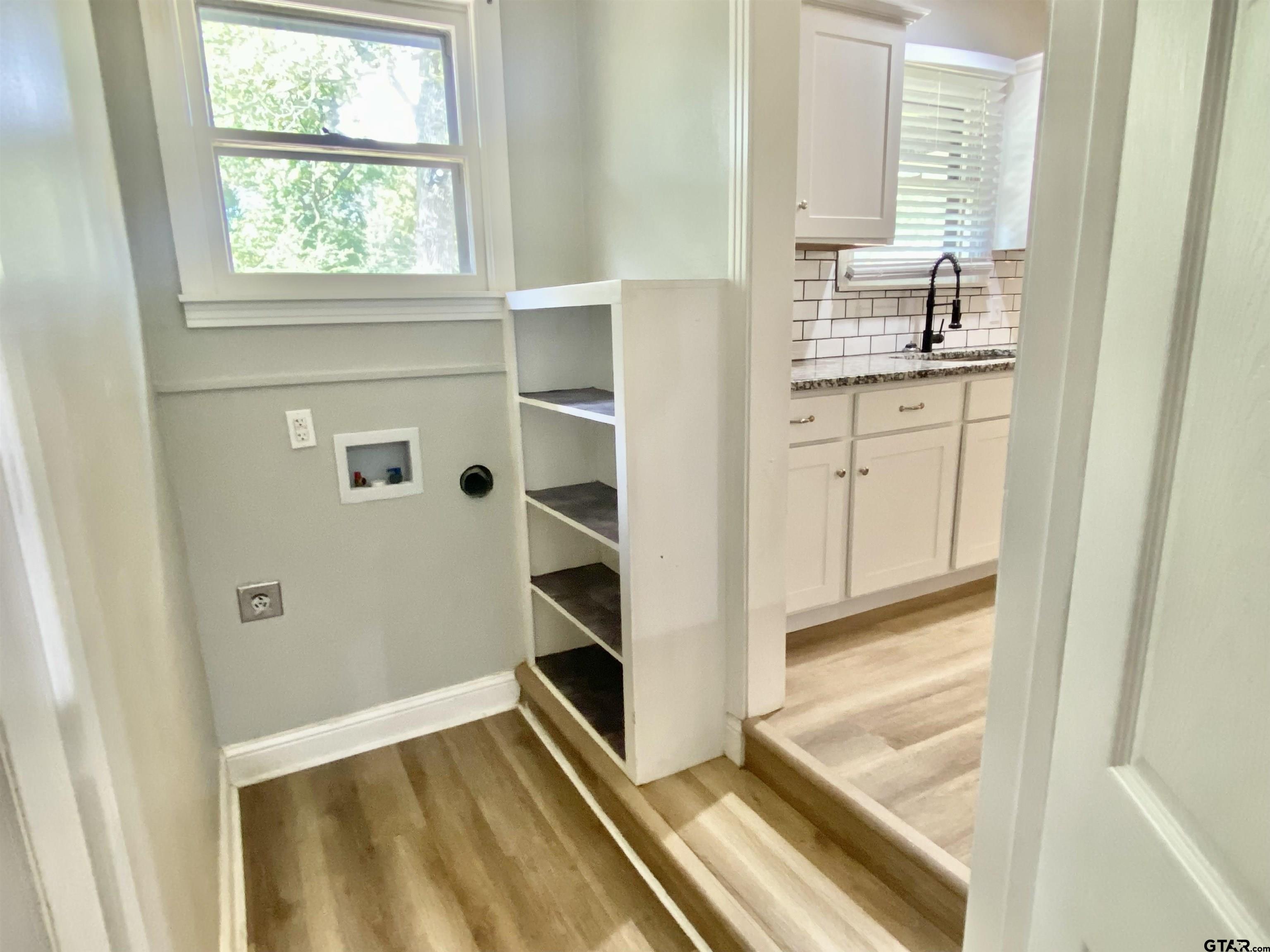 1914 Parklen Street Tyler, TX 75701 - Photo 13 of 39 a view of walk in closet with window