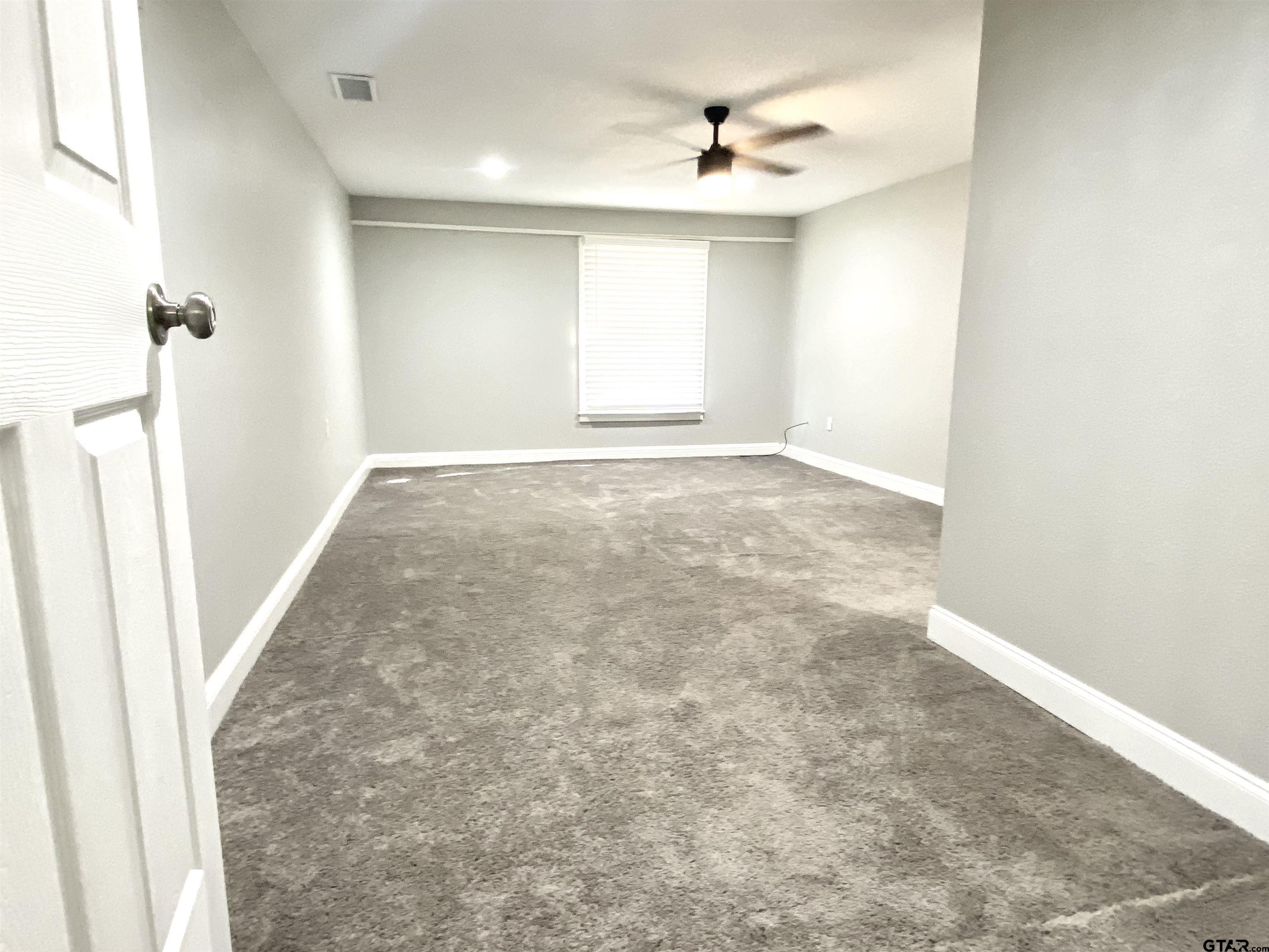 1914 Parklen Street Tyler, TX 75701 - Photo 15 of 39 an empty room with a empty space and a window