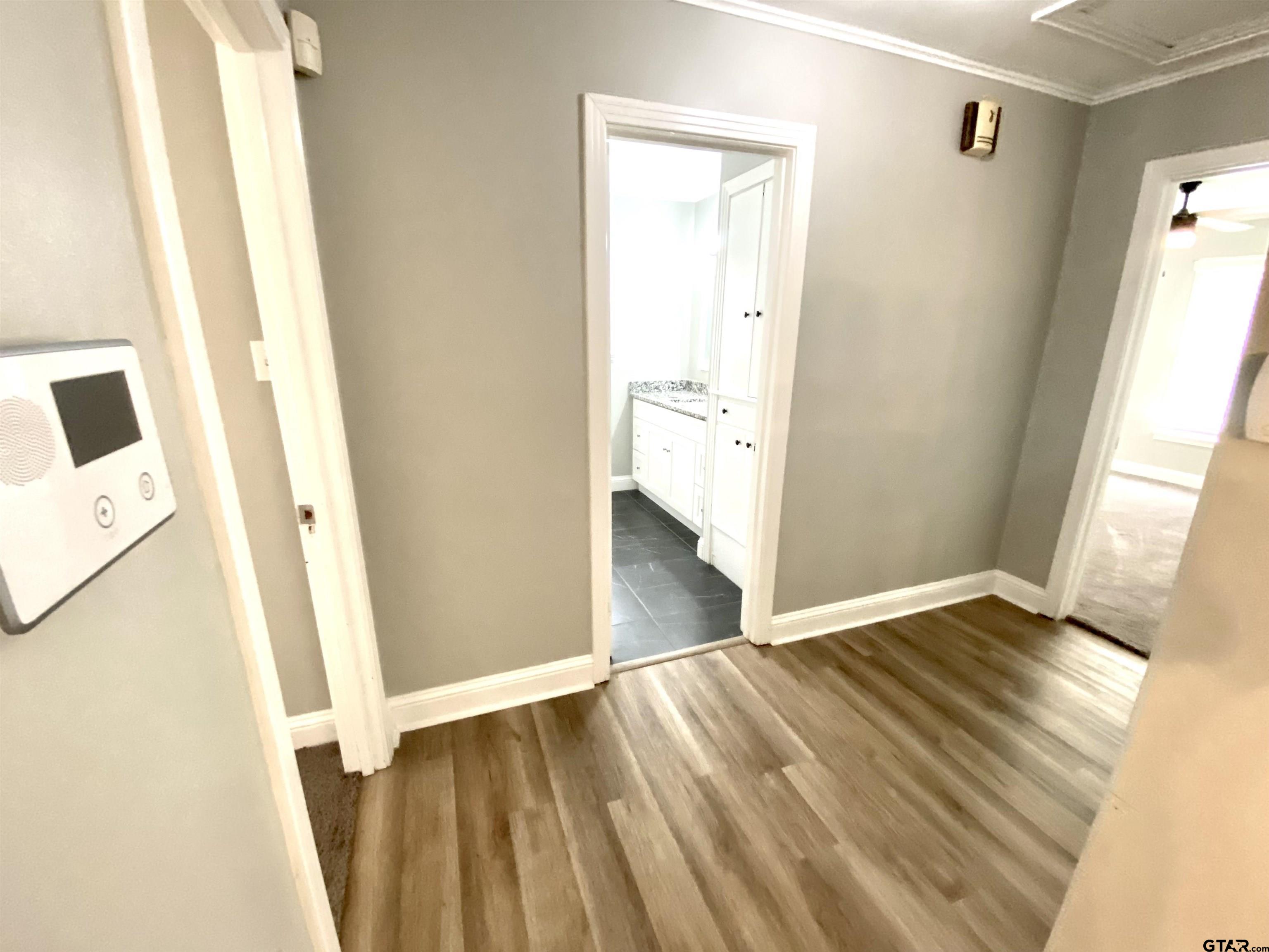 1914 Parklen Street Tyler, TX 75701 - Photo 26 of 39 a view of front door with wooden floor