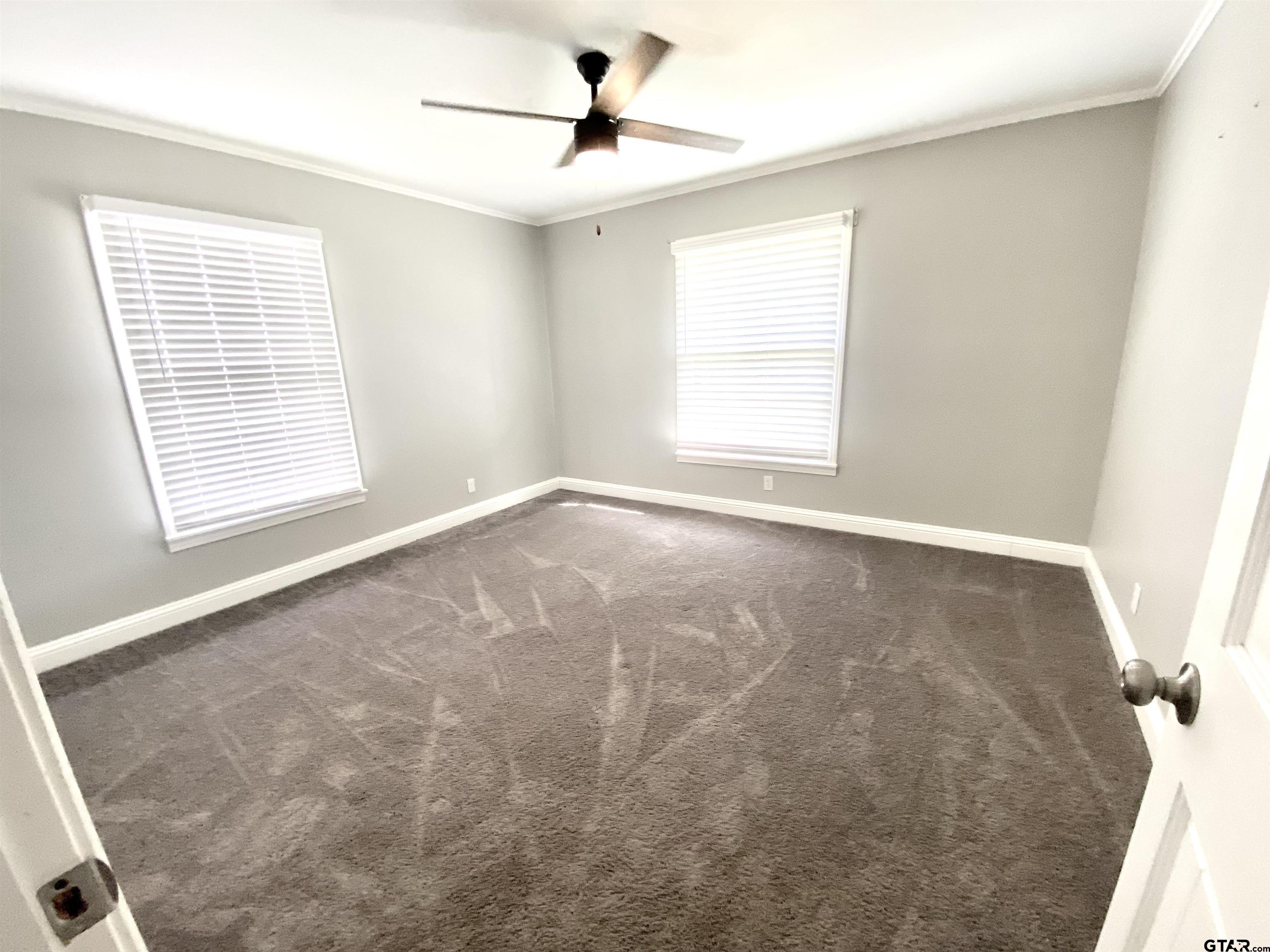 1914 Parklen Street Tyler, TX 75701 - Photo 31 of 39 a view of an empty room with a window