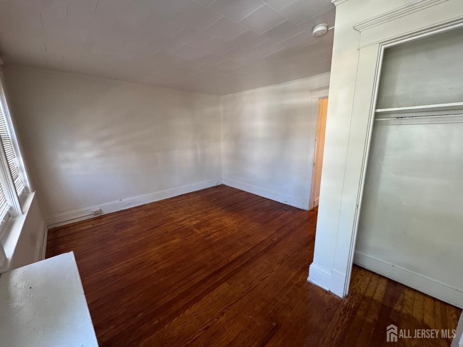 110 Rector Street, Unit 2 Perth Amboy, NJ 08861 - Photo 11 of 11 wooden floor in an empty room