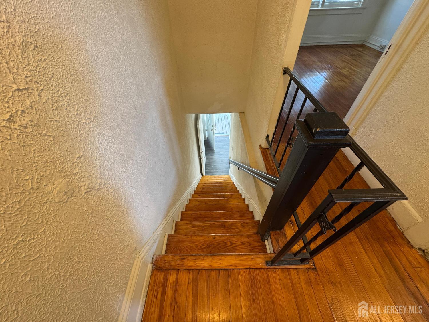 110 Rector Street, Unit 2 Perth Amboy, NJ 08861 - Photo 2 of 11 a view of entryway with wooden floor