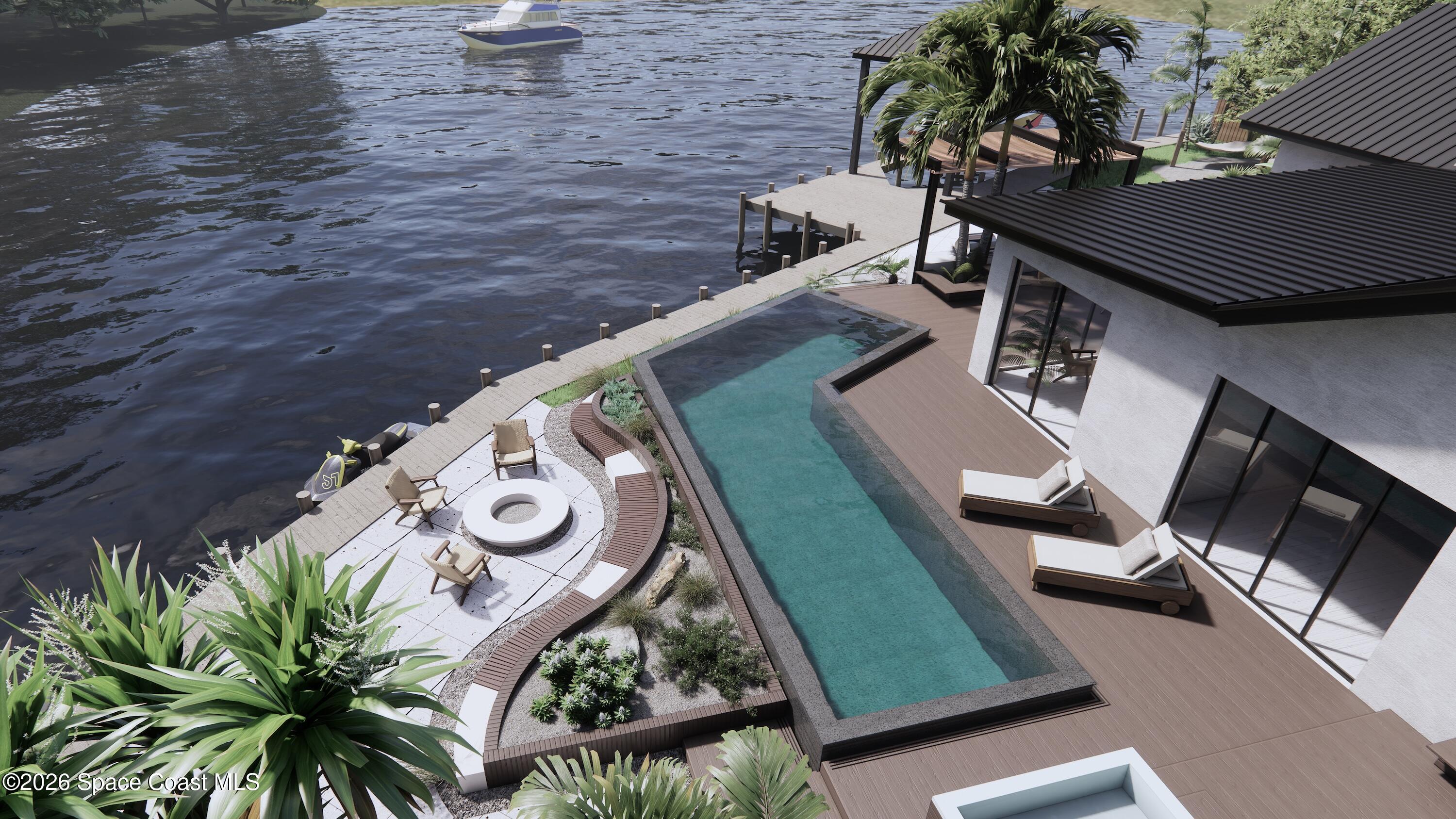 1224 Samar Road Cocoa Beach, FL 32931 - Photo 27 of 56 a view of a backyard with plants and a chair