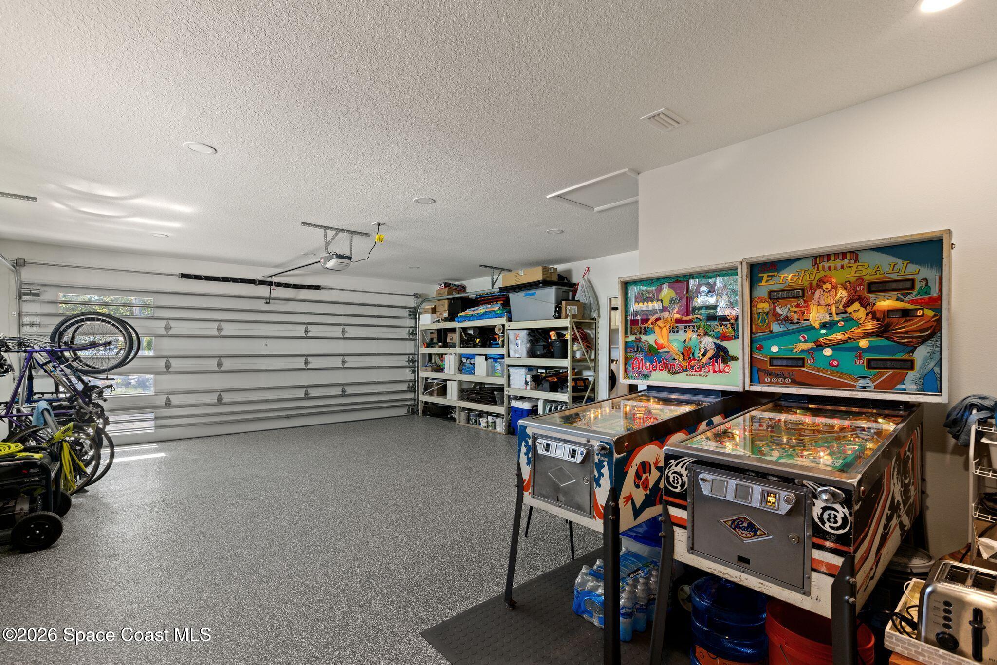 1224 Samar Road Cocoa Beach, FL 32931 - Photo 42 of 56 a view of a room with gym equipment