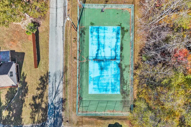 en bathroom with a shower and a mirror