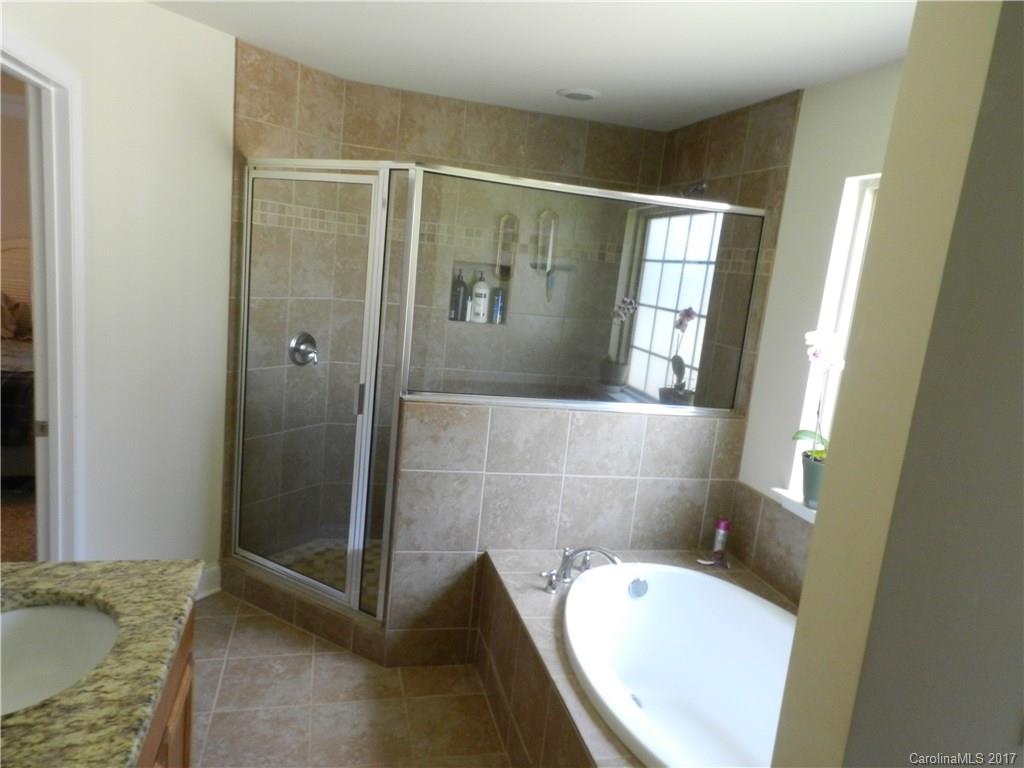 3080 Glenmoor Road York, SC 29745 - Photo 13 of 22 a bathroom with a granite countertop sink and mirror