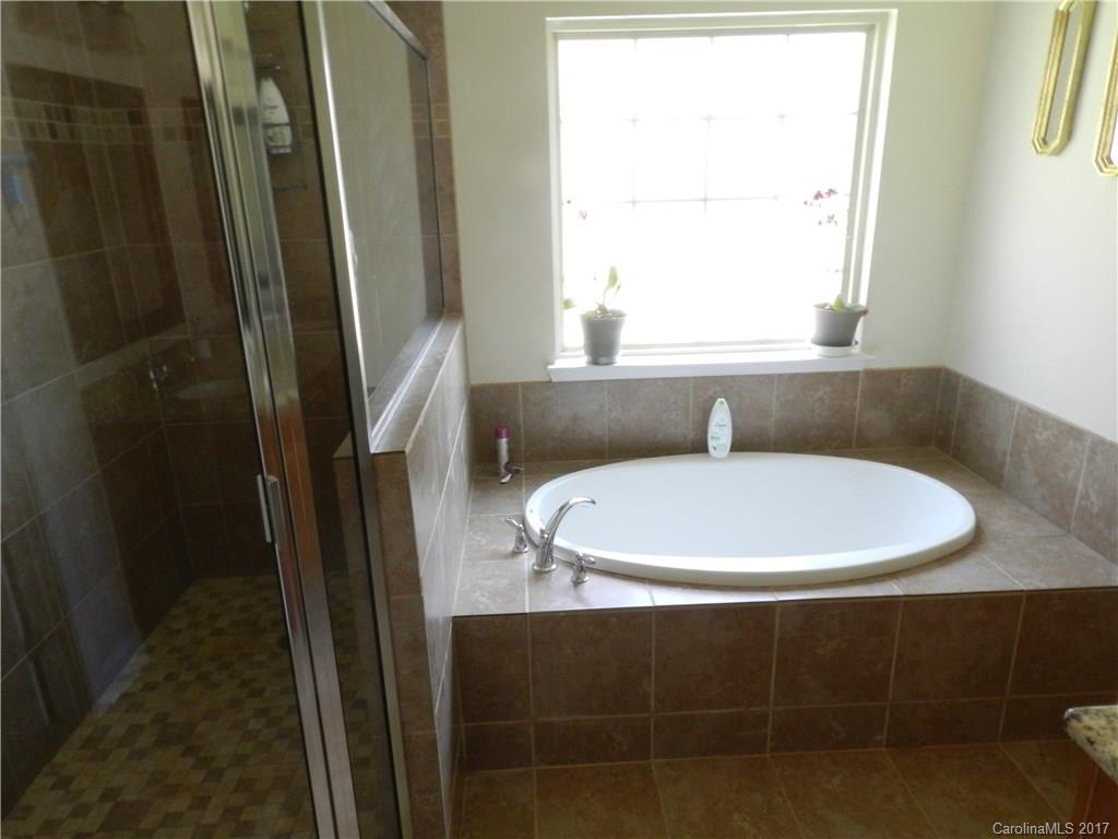 3080 Glenmoor Road York, SC 29745 - Photo 14 of 22 a bathroom with a sink and a mirror