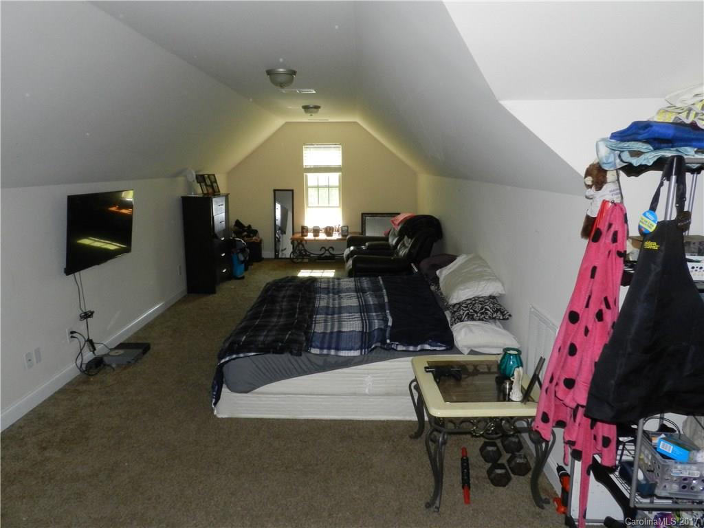 3080 Glenmoor Road York, SC 29745 - Photo 17 of 22 a room with furniture and a flat screen tv