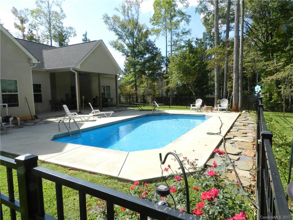 3080 Glenmoor Road York, SC 29745 - Photo 21 of 22 a view of a house with swimming pool and sitting area
