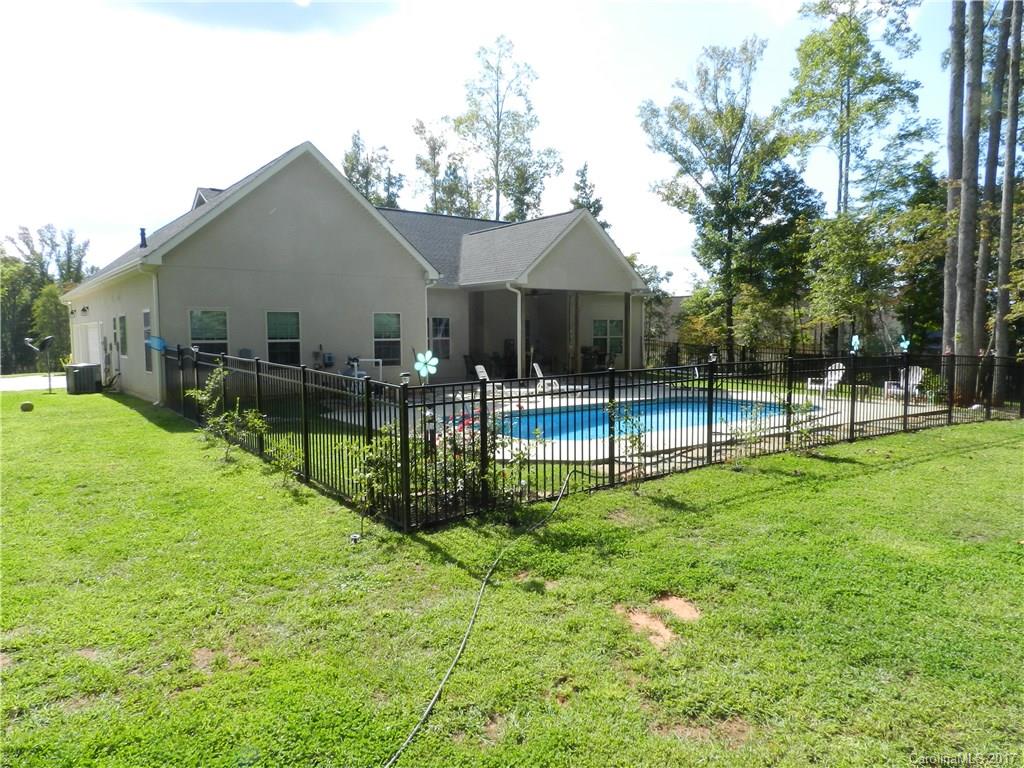 3080 Glenmoor Road York, SC 29745 - Photo 22 of 22 a view of a house with a backyard and a tree
