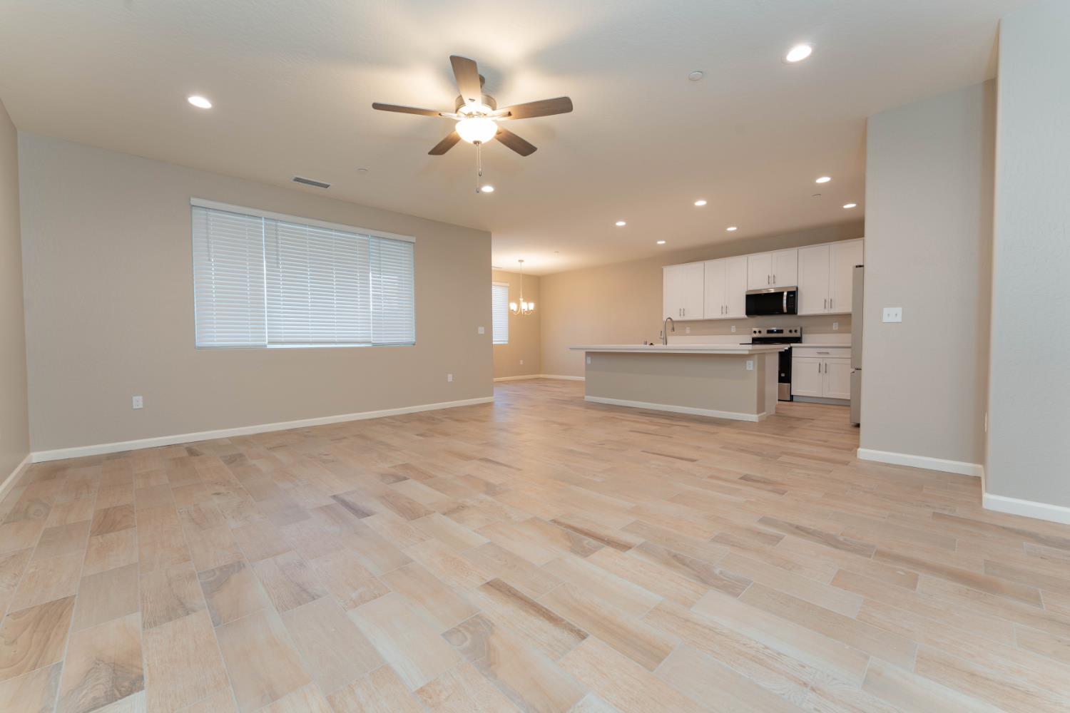 30480 Bellwood Road Visalia, CA 93291 - Photo 5 of 37 a view of an empty room with a window