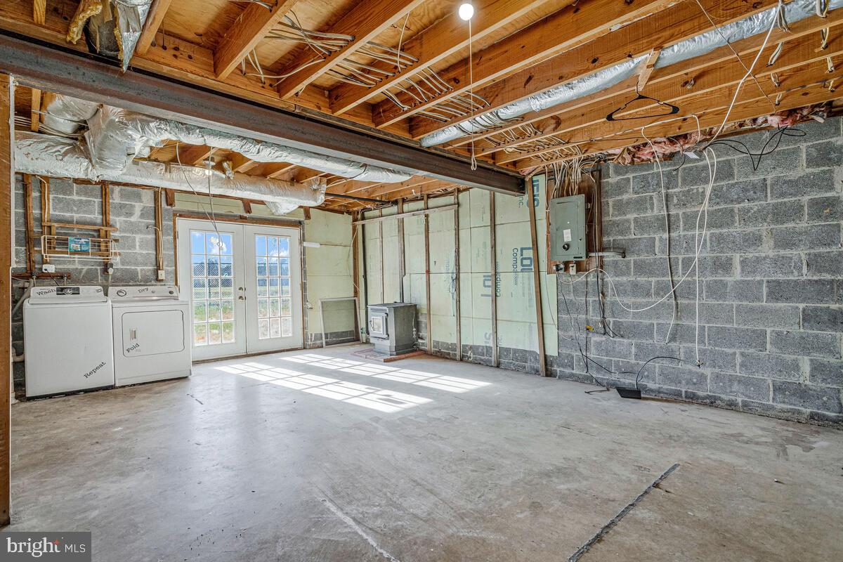 123 Cove Point Road Lusby, MD 20657 - Photo 29 of 38 a view of an empty room with a glass door
