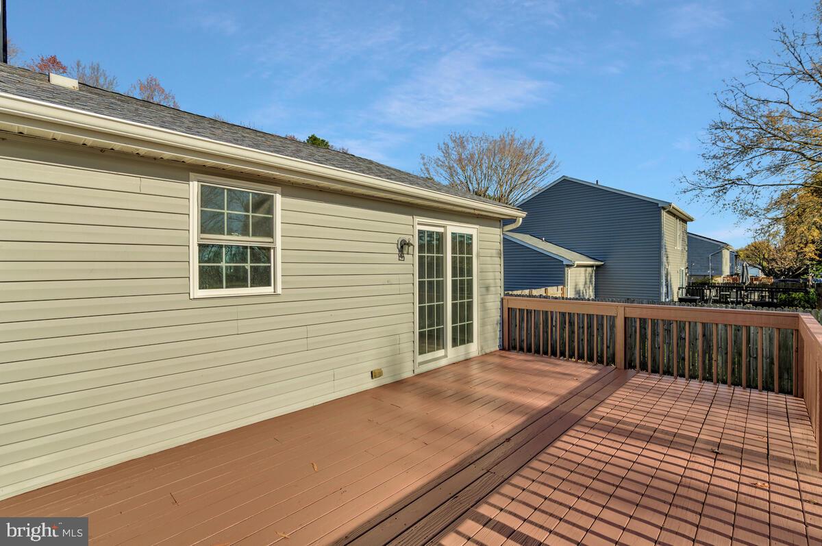 123 Cove Point Road Lusby, MD 20657 - Photo 31 of 38 a view of a house with a roof deck