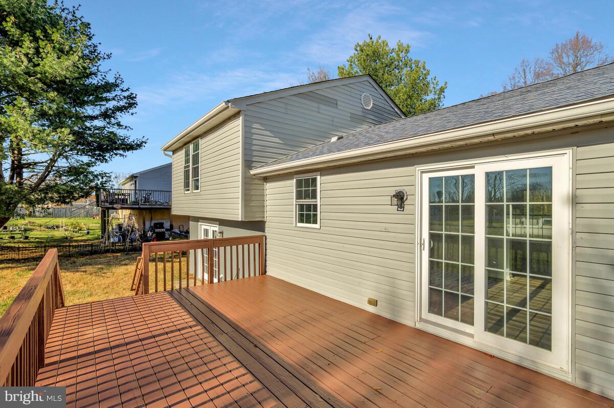 123 Cove Point Road Lusby, MD 20657 - Photo 32 of 38 a view of a house with a large window