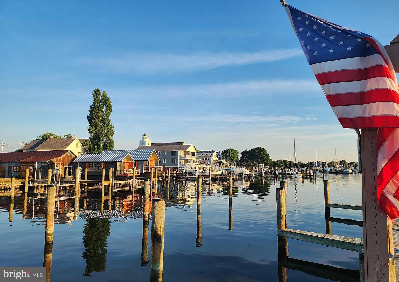 123 Cove Point Road Lusby, MD 20657 - Photo 37 of 38 a view of a balcony with outdoor seating