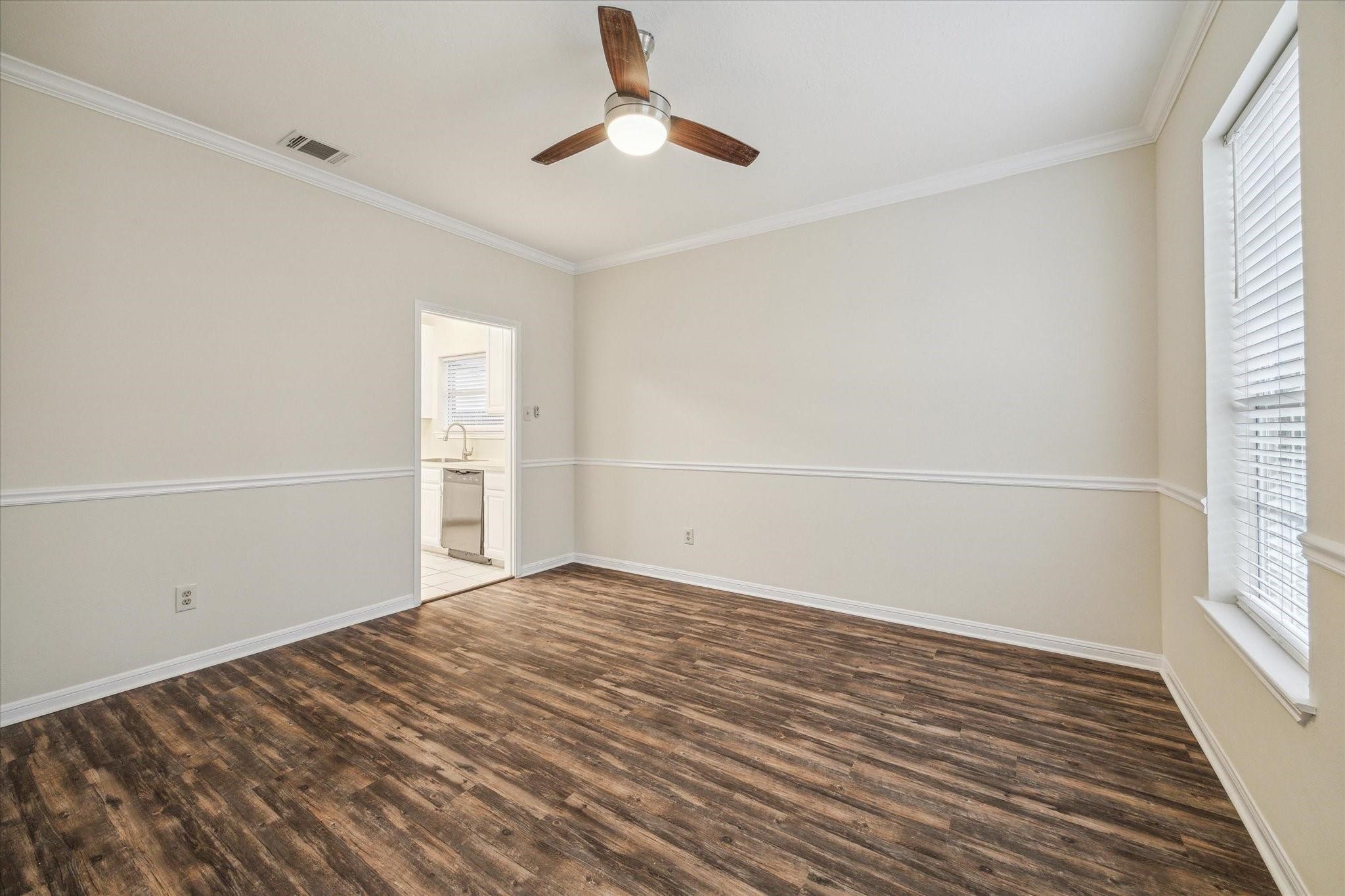 16403 Wellers Way Houston, TX 77095 - Photo 18 of 26 wooden floor in an empty room with a window