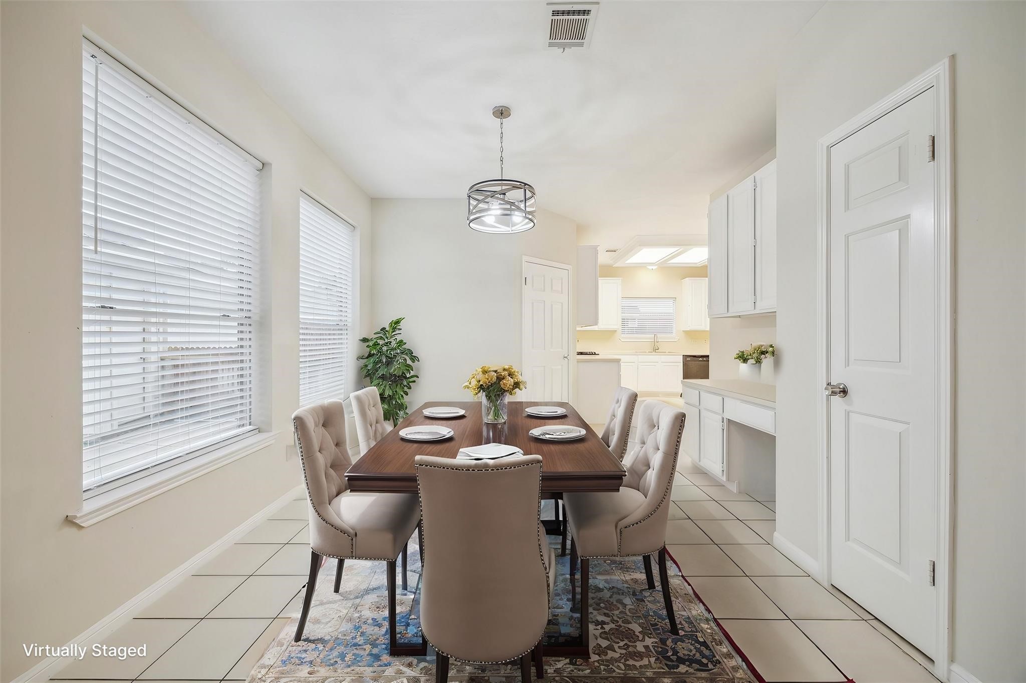 16403 Wellers Way Houston, TX 77095 - Photo 6 of 26 a view of a dining room with furniture and window