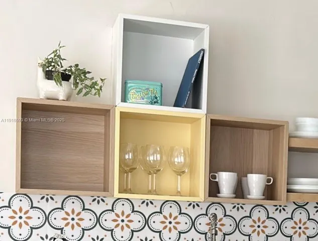 a view of a door and chair in a room