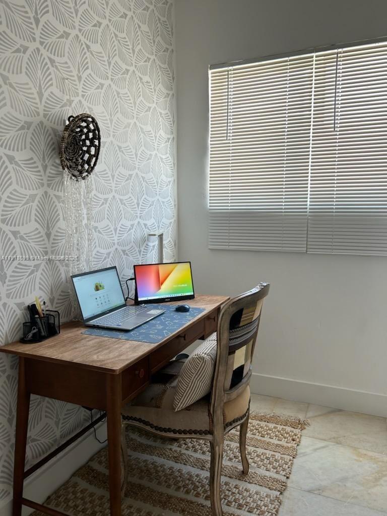 801 8th Street, Unit 201 Miami Beach, FL 33139 - Photo 35 of 37 a workspace with furniture and window