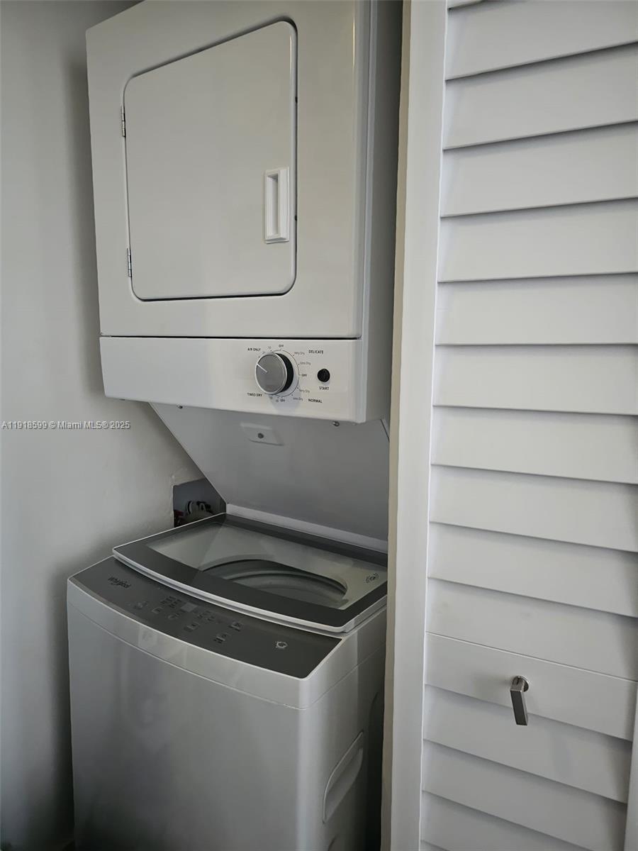 801 8th Street, Unit 201 Miami Beach, FL 33139 - Photo 36 of 37 a utility room with dryer and washer