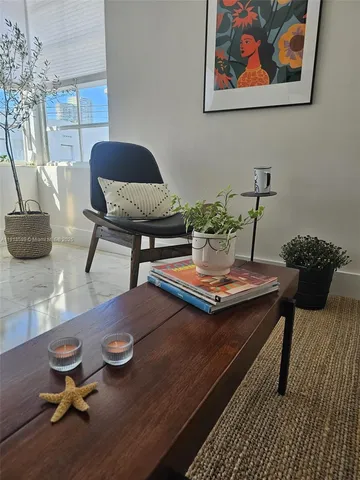 a view of a workspace with furniture