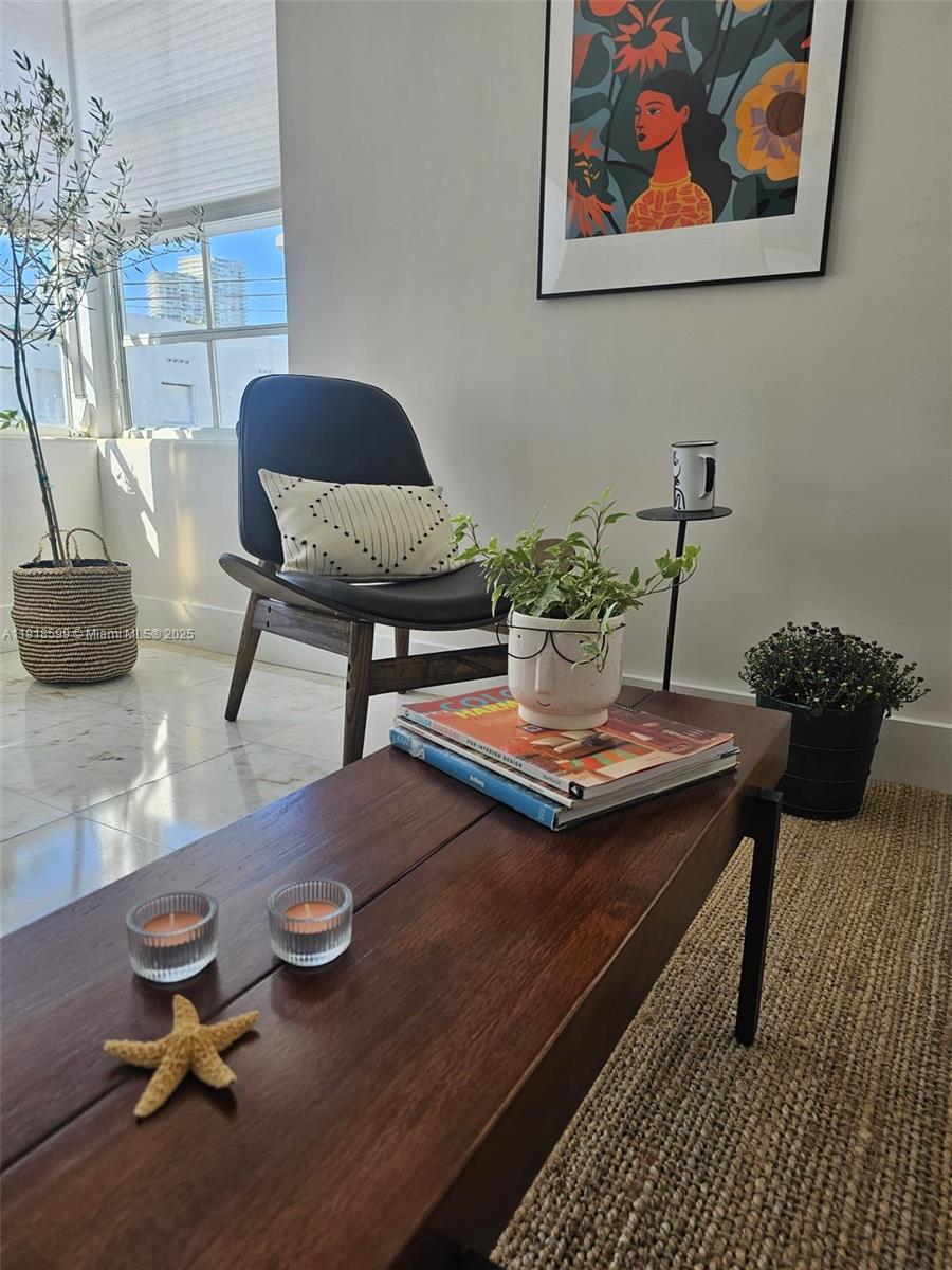 801 8th Street, Unit 201 Miami Beach, FL 33139 - Photo 8 of 37 a view of a workspace with furniture