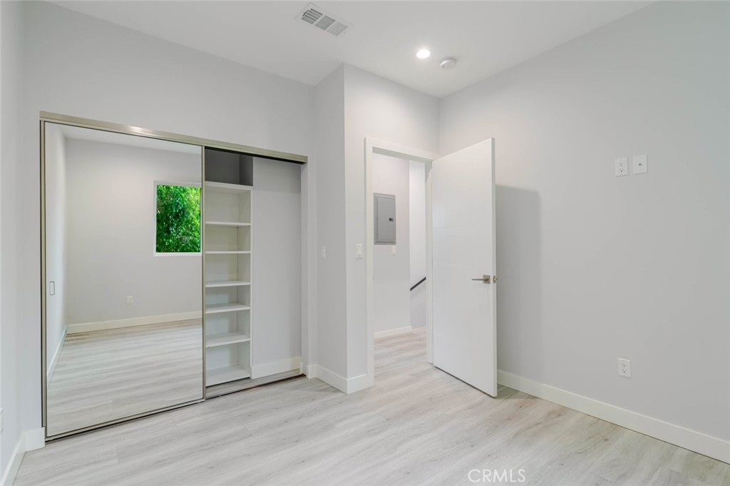 9035 Rathburn Avenue, Unit 1/2 Northridge, CA 91325 - Photo 11 of 25 a view of entryway with wooden floor