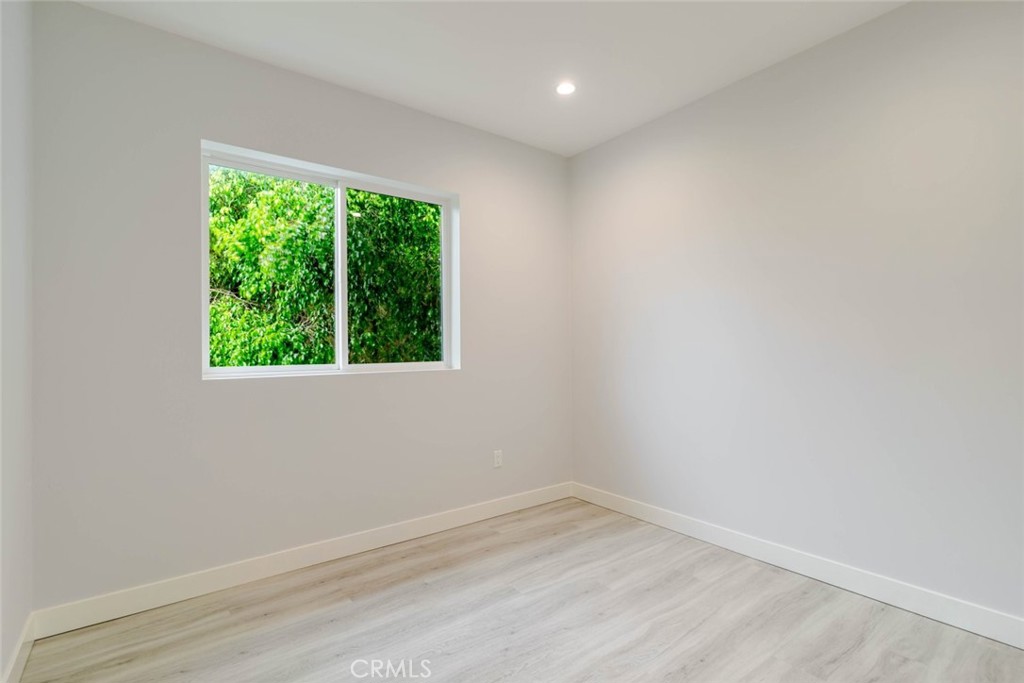 9035 Rathburn Avenue, Unit 1/2 Northridge, CA 91325 - Photo 15 of 25 an empty room with a window