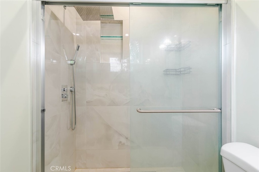 9035 Rathburn Avenue, Unit 1/2 Northridge, CA 91325 - Photo 20 of 25 a bathroom with a shower