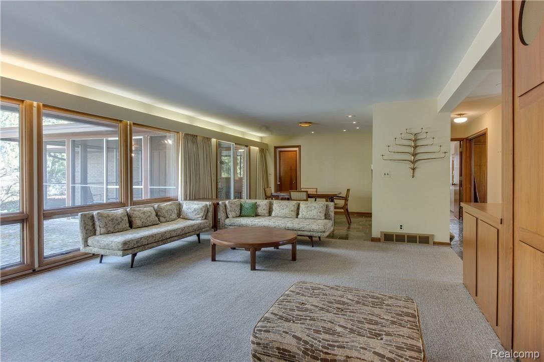 18350 Riverside Drive Franklin, MI 48025 - Photo 8 of 53 Living Room with Floor to Ceiling Windows