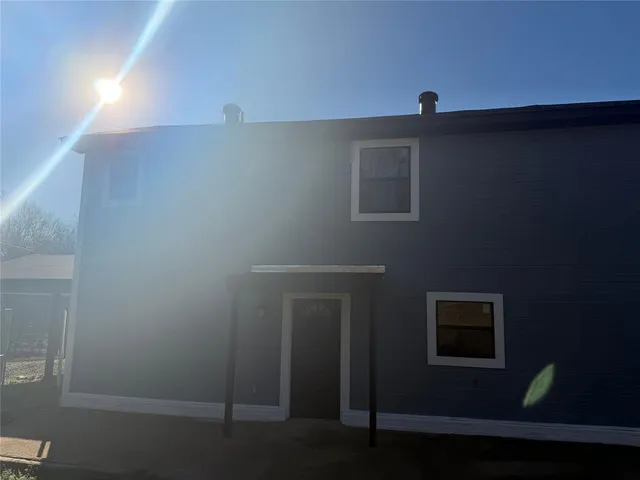 a view of a house with a swimming pool